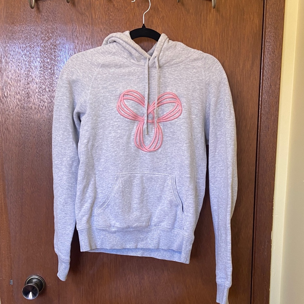 TNA Light Gray Hoodie with Pink Logo